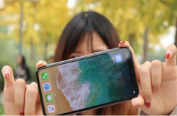 iPhoneXSMax全球首碎：台湾小哥做新机抗摔测试 摔碎了再买