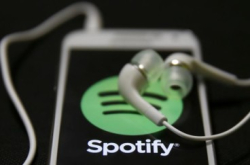 Spotify多谢AppleMusic带挈生意