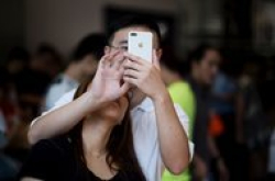 iPhone和无人驾驶汽车，谁能在中国交好运
