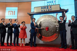 小米上市第二日全天大涨 但长期价值还是未知数