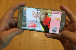 隔空拑公仔